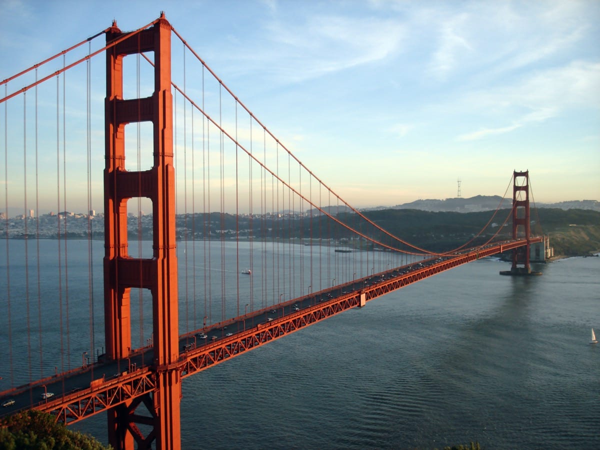 The Golden Gate Bridge cutting through fog: mind mastery does not eliminate fog, it builds something strong enough to cut through it