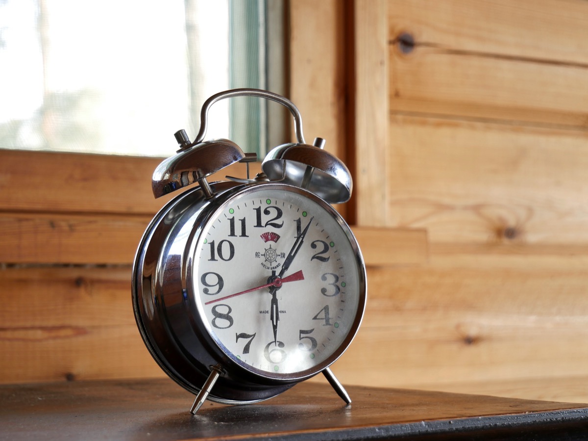 Classic alarm clock showing the time — the moment every morning decision gets made