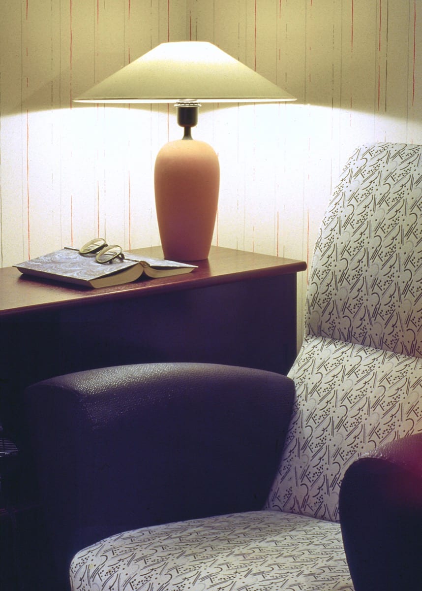 A quiet armchair beside a reading lamp: the seductive comfort of planning instead of shipping