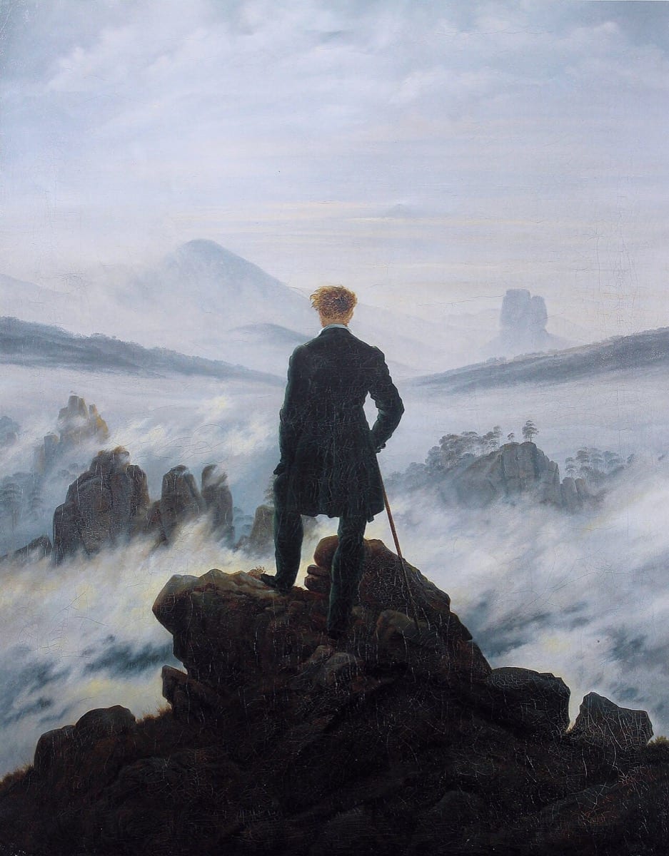A solitary figure above the fog: run your own race, alone on your own path