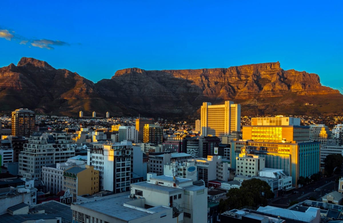 Mountain peak standing firm at dawn, quiet power: confidence in uncertainty is not confidence that things will work out, but confidence you can handle whatever happens